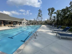 Towns at Swift Creek in Midlothian, VA lap pool with outdoor lounge and grill pavilion